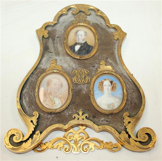 Three Victorian oil on ivory portrait miniatures of members of the Huggins family (Lion Brewery), overall 7.75in.